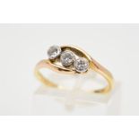 A THREE STONE DIAMOND RING, three brilliant cut diamonds in a diagonal row with cross over band,