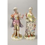 A PAIR OF LATE 19TH CENTURY GERMAN PORCELAIN FIGURES, in 18th century costumes, florally