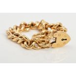 A MODERN 9CT GOLD HEAVY WEIGHT CURB CHARM BRACLET, measuring approximately 180mm in length, together