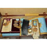 A CASE OF MASONIC REGALIA, including several silver gilt medallions, apron, cuffs, sash, white
