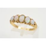 A 9CT GOLD FIVE STONE OPAL RING, designed as a graduated row of five opal cabochons within fancy