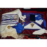 A BRIEFCASE CONTAINING MASONIC REGALIA, including apron, sash, medallions, skull cap, white gloves