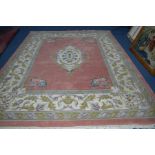 A LARGE WOOLLEN PINK AND CREAM GROUND CARPET SQUARE, with foliate decoration, 366cm x 274cm