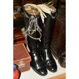 A PAIR OF BLACK LEATHER RIDING BOOTS, size 9, leather lined, with wooden stretchers, 'Never Rust'