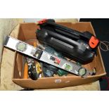 A BOX CONTAINING A CASED BLACK AND DECKER DRILL, Black and Decker heat gun, Bosch drill, two Stanley