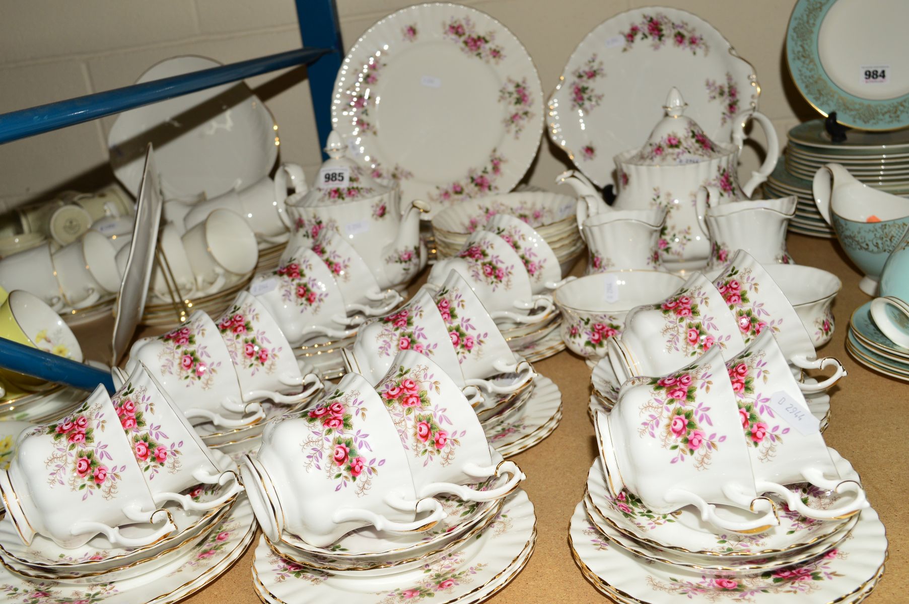 ROYAL ALBERT 'LAVENDER ROSE' DINNER/TEA WARES, including two teapots, sixteen tea cups, saucers,