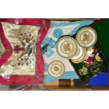 A BOX OF MASONIC REGALIA, including two aprons, books, gilt metal medallions, leather and gold