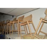 A SET OF FIVE MODERN BEECH BAR STOOLS