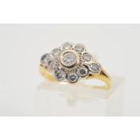 A GOLD DIAMOND CLUSTER RING, designed as a tiered cluster of brilliant cut diamonds with brilliant