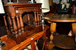 A REPRODUCTION OAK NEST OF THREE TABLES and a similar oak circular occasional table (2)