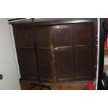 A VICTORIAN STAINED PINE TWO DOOR SCHOOL CUPBOARD AND CONTENTS, 150x73x123cm