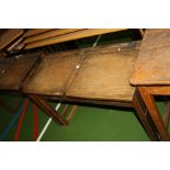 A VINTAGE DOUBLE SCHOOL DESK, with oak top, two lift up lids, two copper sliding ink well cover