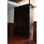A PAINTED PINE VICTORIAN HOUSE KEEPERS CUPBOARD, with two panelled doors over two drawers, three