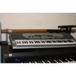 A CASIO CTK-573 ELECTRONIC KEYBOARD, and two keyboard stands