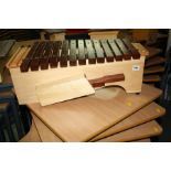 A NEW ERA PERCUSSION XYLOPHONE, with a thirteen key bed and rosewood sixteen blocks (three spare)