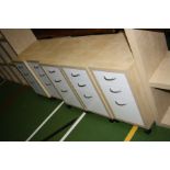 FIVE MODERN MAPLE EFFECT AND WHITE BEDSIDE DRAWERS, with three graduating drawers, stainless steel