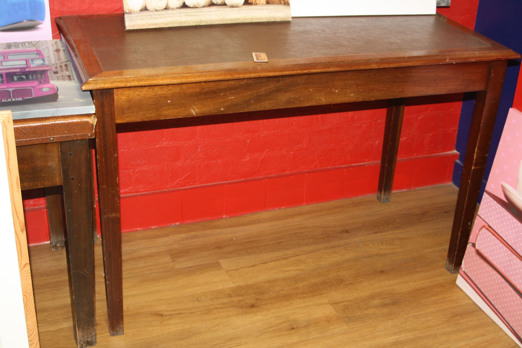 A MAHOAGANY LIBRARY TABLE, with a later leatherette insert to top, 122x61x77cm high (s.d)