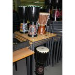 FOUR PERCUSSION WORKSHOP JAMMER SERIES AFRICAN DRUMS, with painted designs to the lower half and