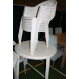 A WHITE PLASTIC ROUND GARDEN TABLE AND SIX CHAIRS, 92cm in diameter (s.d)