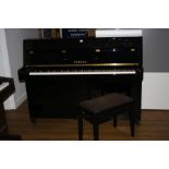 A YAMAHA B1PE EBONISED UPRIGHT PIANO, Serial No.J25156454, 144cm wide 110cm high and an ebonised