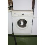 A BUSH WM-1260TVE WASHING MACHINE, 60cm wide