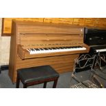 A YAMAHA E108 UPRIGHT PIANO, in walnut case Serial No.5903243 and a Yamaha piano stool