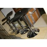 FOUR MODERN BACK AND CHROME BAR STOOLS, with height adjustment up to 80cm and foot supports (s.d)
