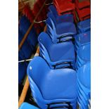 A SET OF TWENTY TWO BLUE PLASTIC STACKABLE CHAIRS (22)