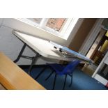 A POLYFOLD PLASTIC CATERING TABLE, 6ft long, a Gopak folding and stacking bench and a plastic