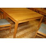 A SOLID OAK LIBRARY TABLE, with tapered block legs, 183x88x76cm high