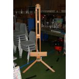 A MODERN BEECHWOOD ARTISTS ADJUSTABLE EASEL, height adjusted from 170cm to 240cm