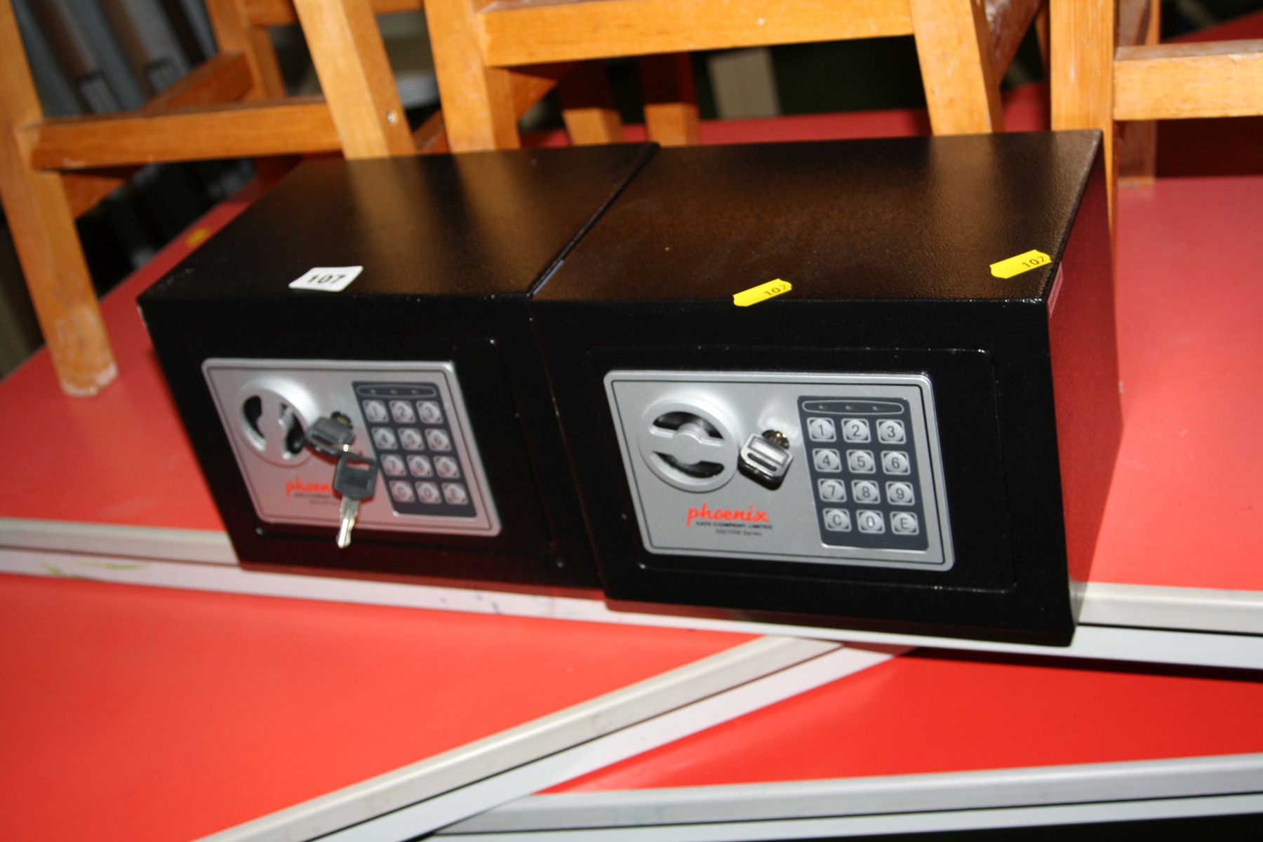 TWO BLACK PHEONIX PERSONAL ELECTRONIC SAFES, 23x17x17cm with three keys