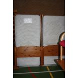TWO PINE SINGLE BEDS FRAMES WITH MATTRESSES, 98cm wide (s.d)