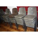 TWENTY FIVE STACKING CLASSROOM CHAIRS, with moulded plastic seats and tubular metal frames