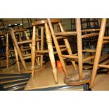 FOUR VARIOUS WOODEN STOOLS WITH OVAL TOPS, including a pair with turned legs, height 60cm to 61.