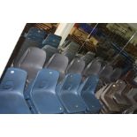 FORTY TWO STACKING CLASSROOM CHAIRS, with moulded grey plastic seats over a tubular metal frame