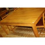 A SOLID OAK LIBRARY TABLE, with tapered block legs, 183x88x76cm high