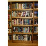 AN OAK VENEERED STANDING BOOKCASE, with four adjustable shelves, 101x35x200cm high (s.d) (content