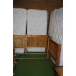 FOUR CORONA PINE SINGLE BEDFRAMES AND MATTRESSES, 98cm wide (s.d)