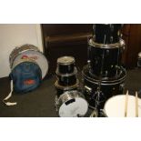 A STAGG TIM FIVE PIECE DRUM KIT, in black including 22''x16'' kick, 12''x8'' Tom, 13''x9'' Tom,,