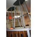 A PAIR OF METAL AND PLASTIC LAB STOOLS, oval seats, height 72cm (2)