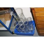 A BOX OF GLASS FLASKS, beakers and cylinders, for chemistry experiments