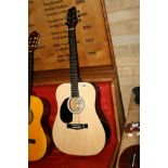 A STAGG SW201LH-N, left handed dreadnought acoustic guitar in natural finish