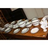 AN EARLY 20TH CENTURY MINTONS PART DINNER SERVICE, some damage