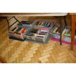 FIVE PLASTIC BOXES ON FICTION AND REFERENCE BOOKS, including Enid Blyton, Philippa Gregory, etc