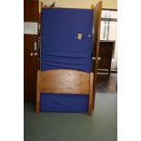 A PINE SINGLE BED FRAME AND A WATERPROOF MATTRESS, 98cm wide