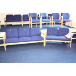 A MORLEY'S CONFERENCE ROOM THREE SEAT SOFA AND A TWO SEAT SOFA, upholstered in blue over a beechwood