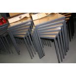 TWELVE MODERN STACKING SQUARE CLASSROOM TABLES, with beech effect tops over a tubular metal base (