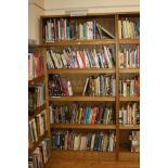 AN OAK VENEERED STANDING BOOKCASE, with four adjustable shelves, 101x35x200cm high (s.d) (content