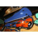 A CHINESE 3/4 VIOLIN, in hard case with a bow